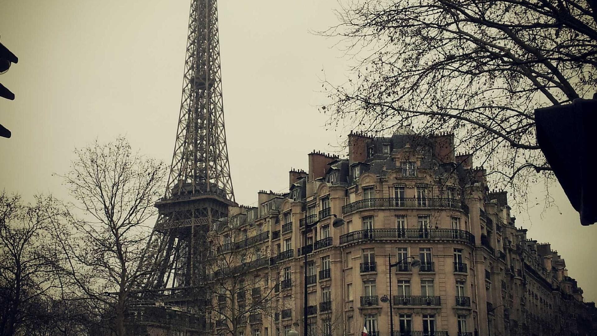 A vibrant event with confetti falling on a joyful crowd.